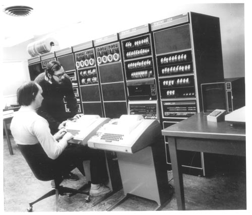 Ken Thompson and Dennis Ritchie in front of DEC PDP-11